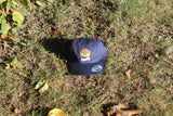 Vacationland Unstructured Cap in Navy, Stone, and Orange